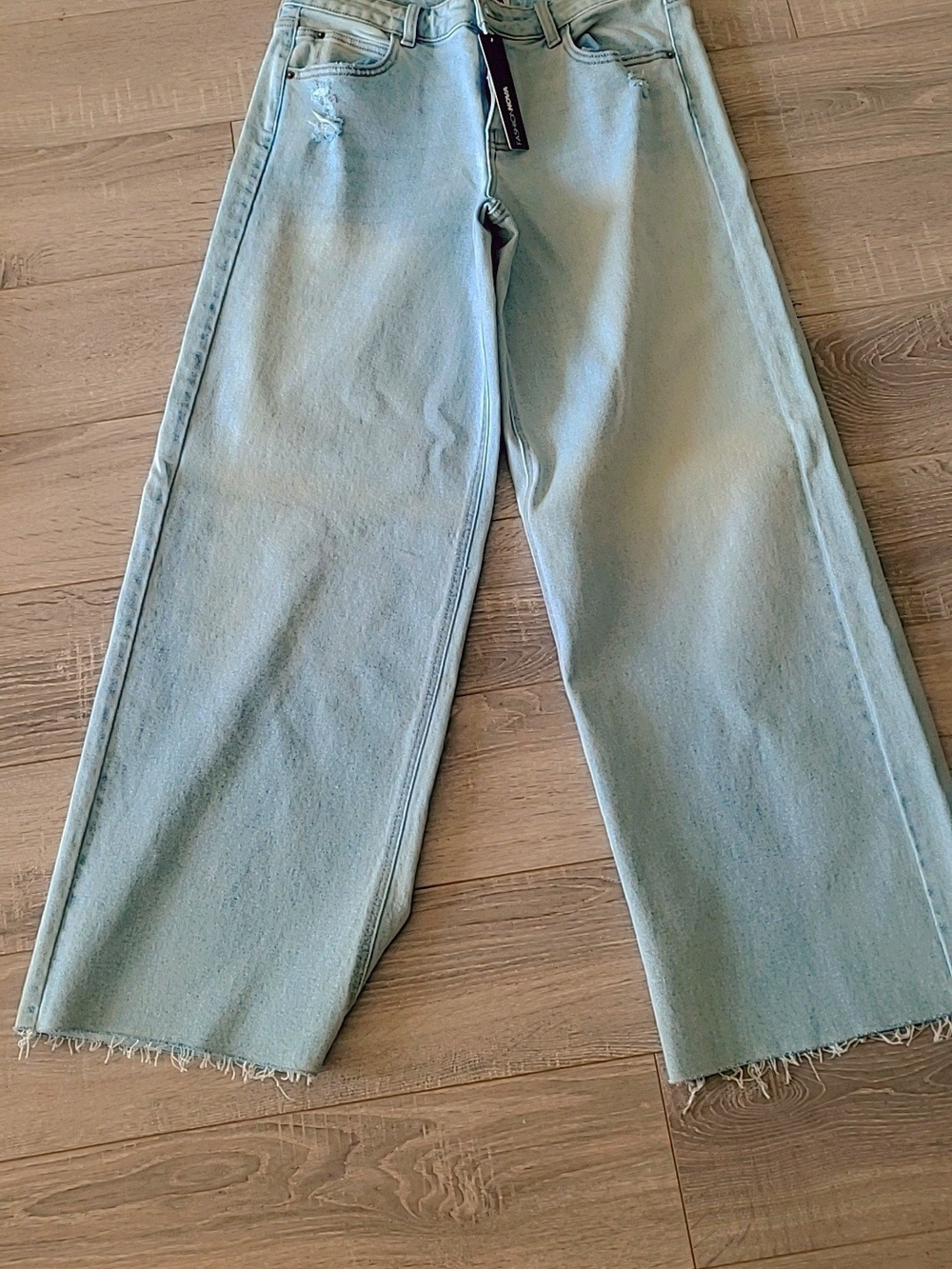 Light Blue Wide-Leg Jeans with Frayed Hem